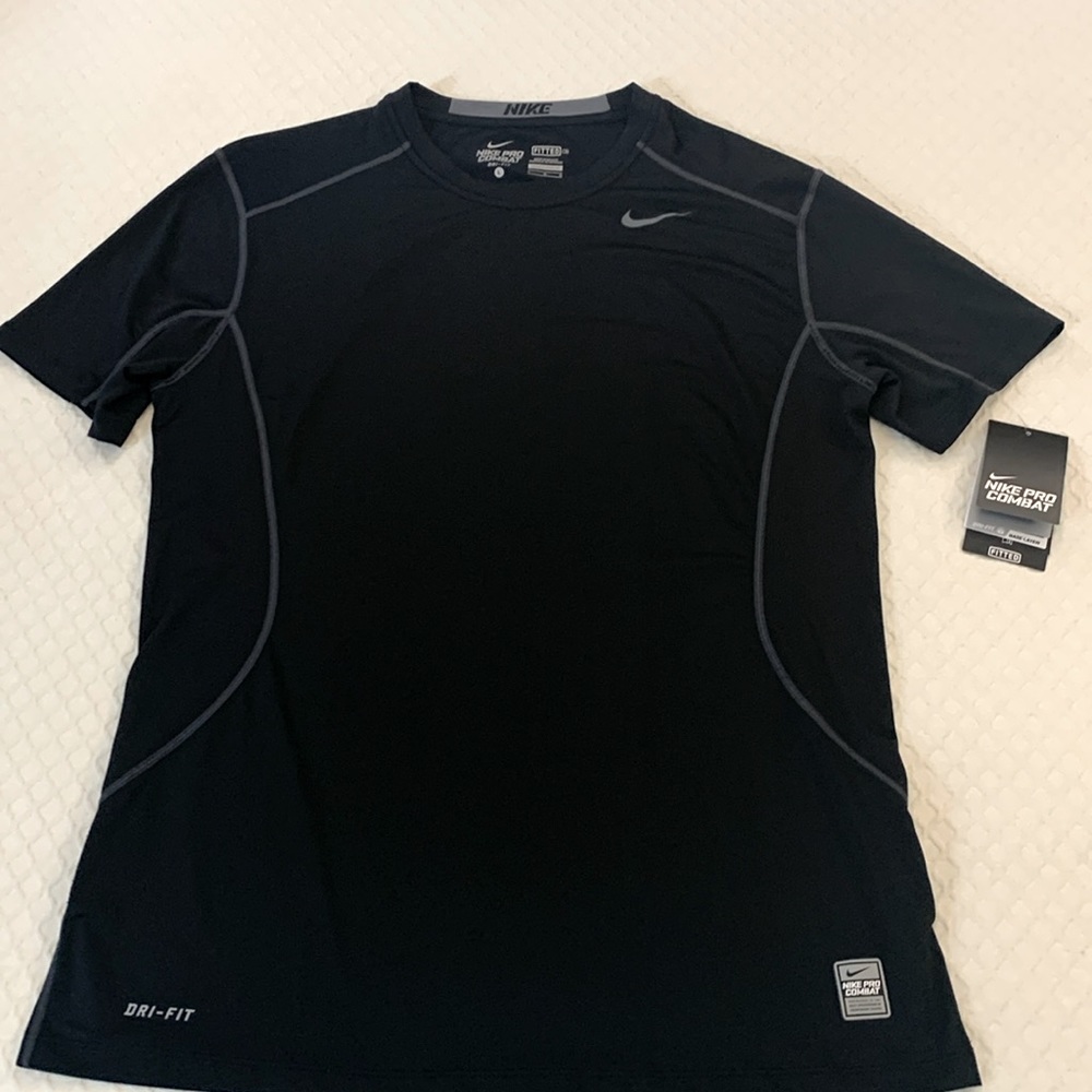 New, with tags, men’s Nike dri-fit shirt, size L